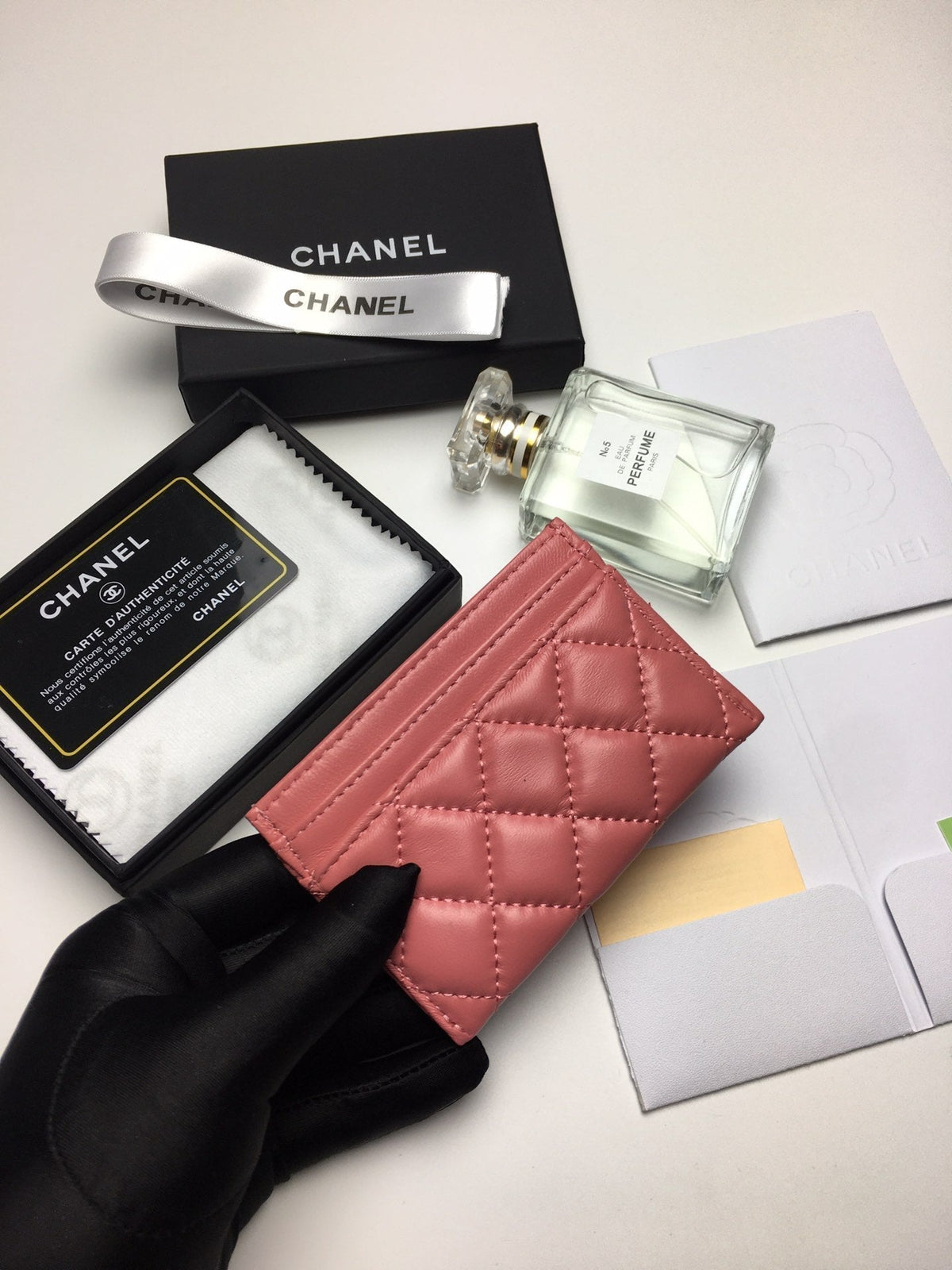 CC BOY CARD HOLDER 11.2 CORAL CALFSKIN GOLD ICON