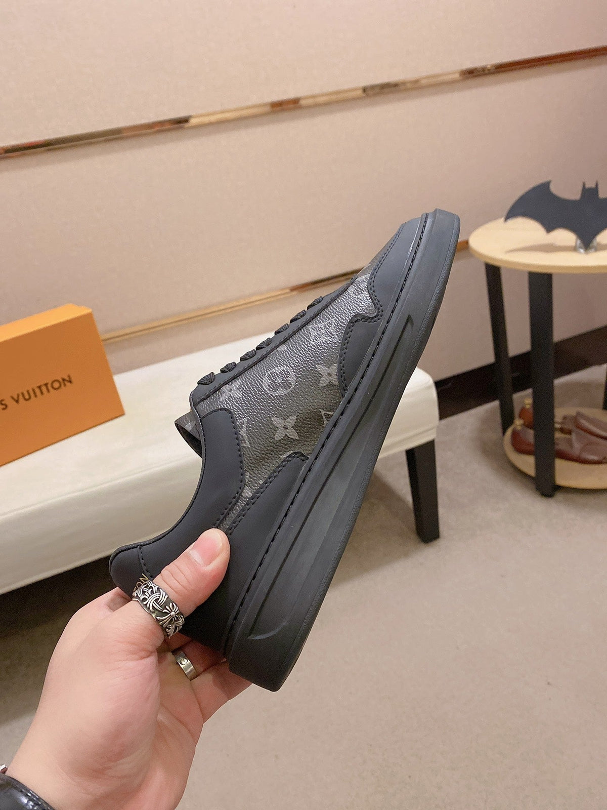 LV TRAINER IN BLACK MIX DARK BROWN CALFSKIN