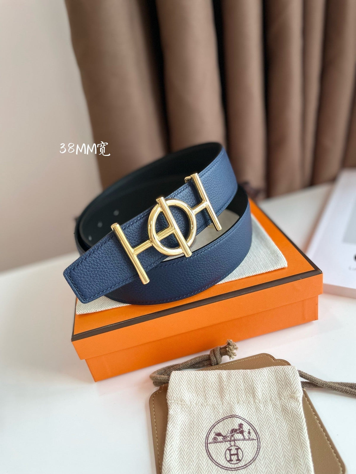 ULYSSE BELT BUCKLE & REVERSIBLE NAVY BLUE LEATHER STRAP 38MM GOLD HARDWARE