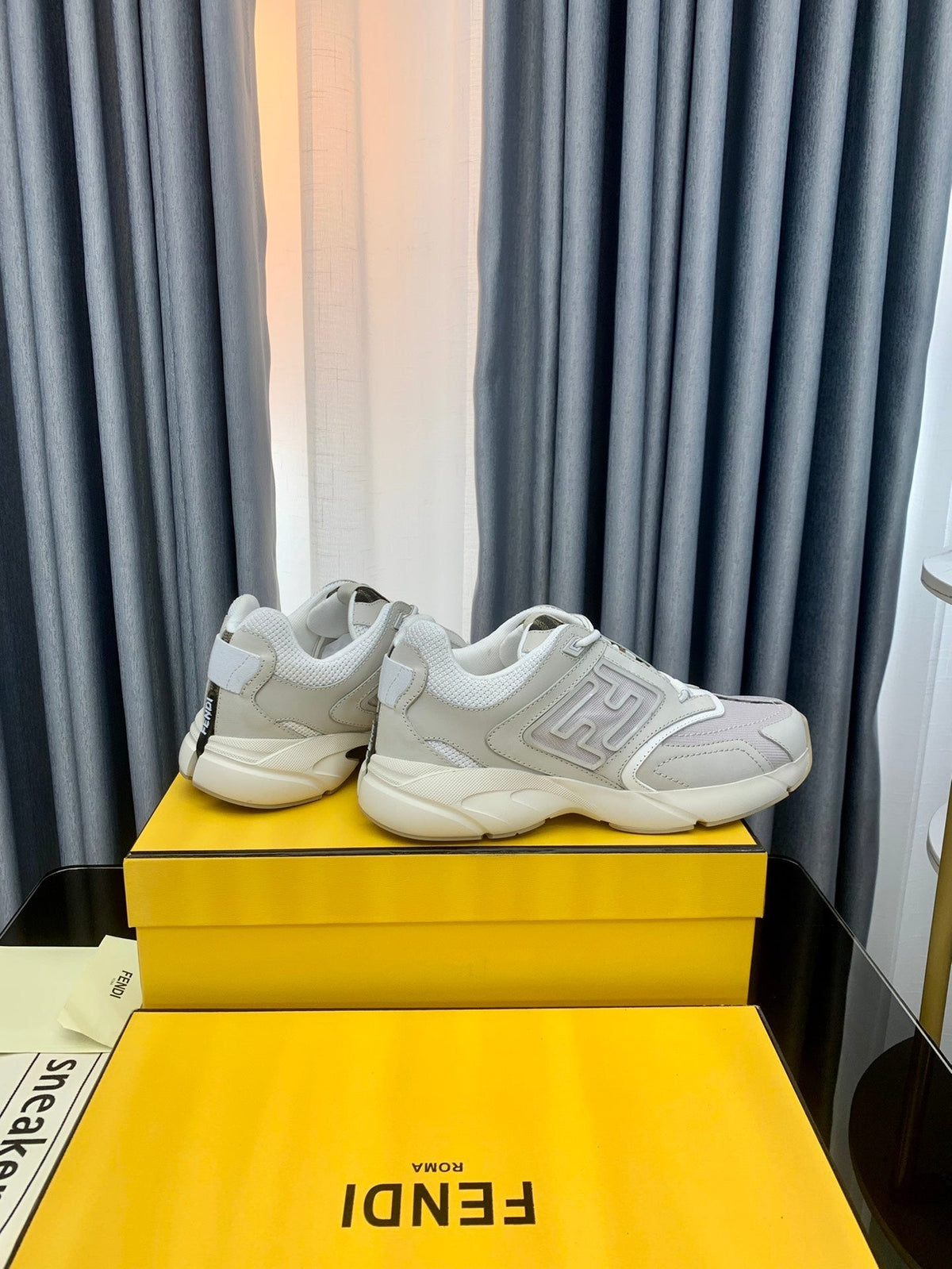 FENDI FASTER TRAINER IN GREY CALFSKIN AND SUEDE