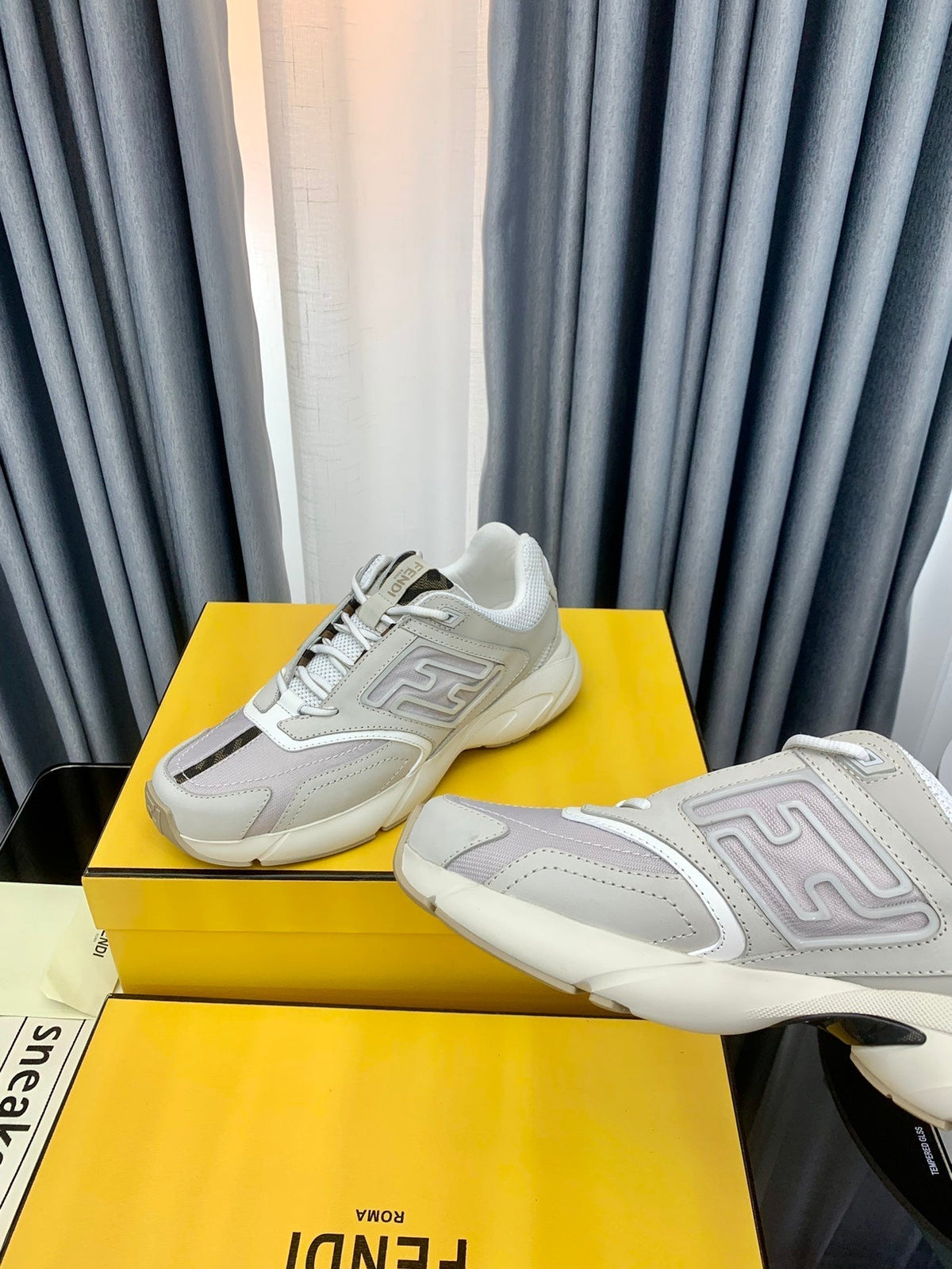 FENDI FASTER TRAINER IN GREY CALFSKIN AND SUEDE
