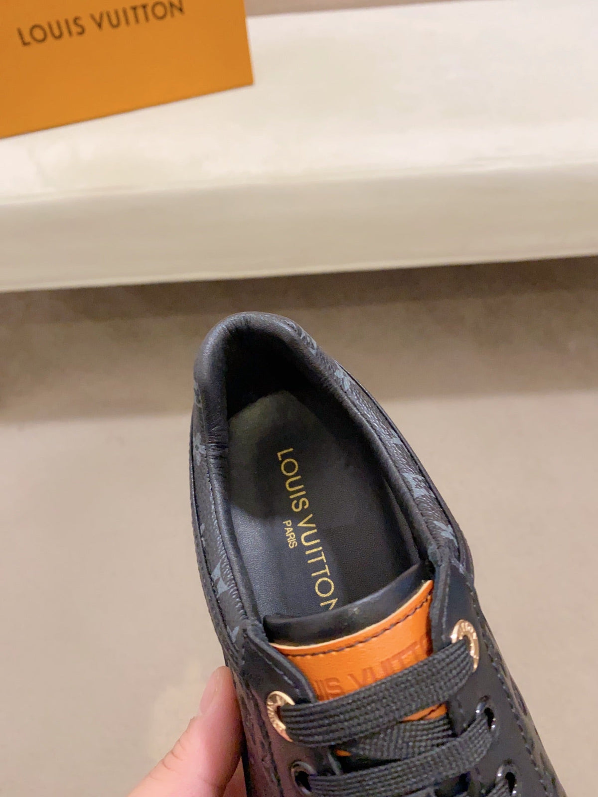 LV RIVOLI SNEAKER BLACK MINI MONOGRAM-EMBOSSED CALFSKIN
