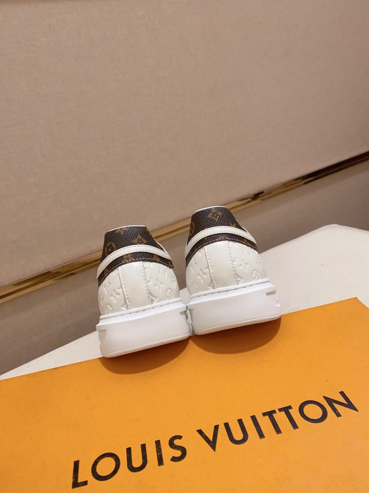LV RIVOLI SNEAKER WHITE MINI MONOGRAM-EMBOSSED CALFSKIN