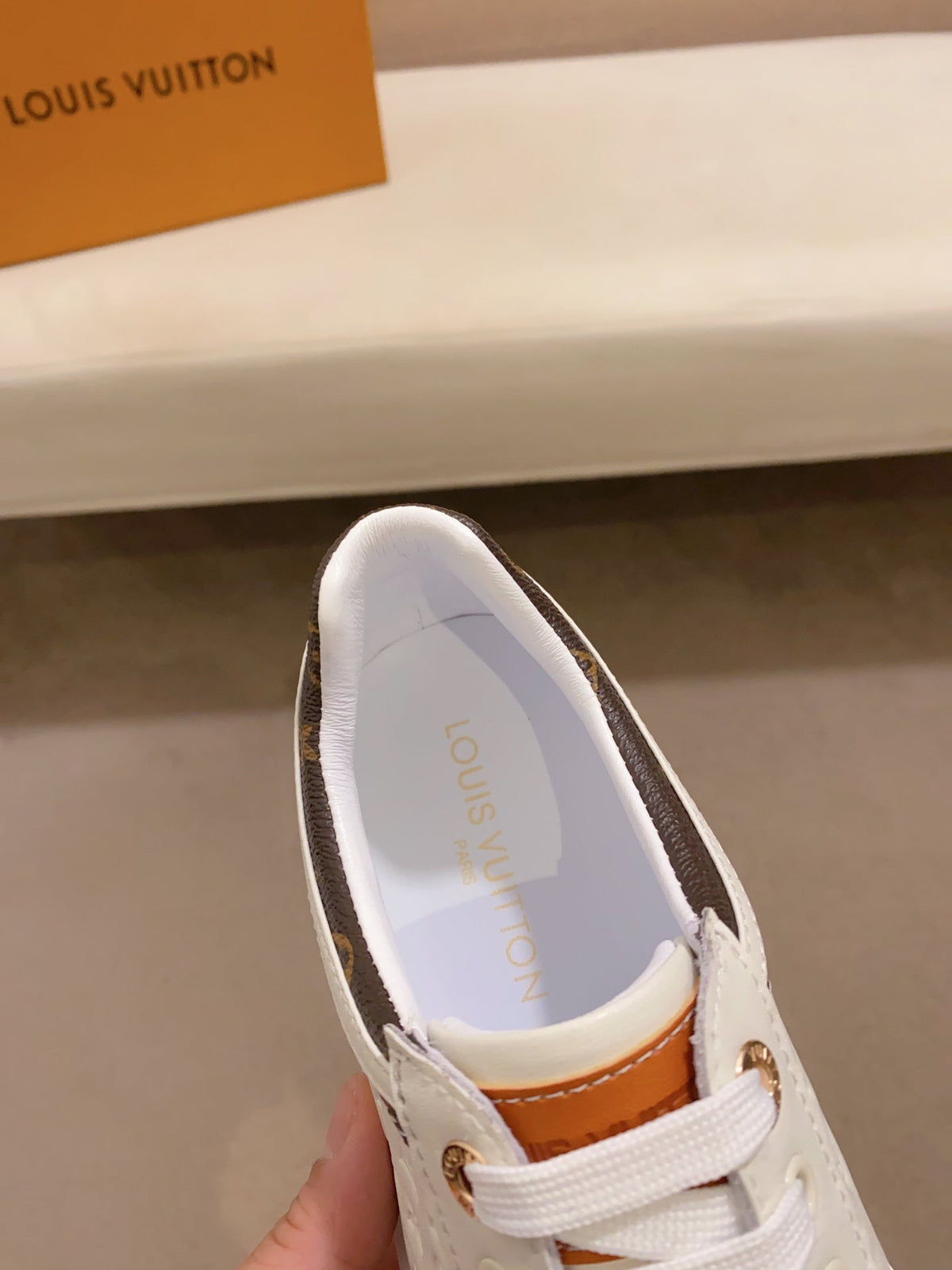 LV RIVOLI SNEAKER WHITE MINI MONOGRAM-EMBOSSED CALFSKIN