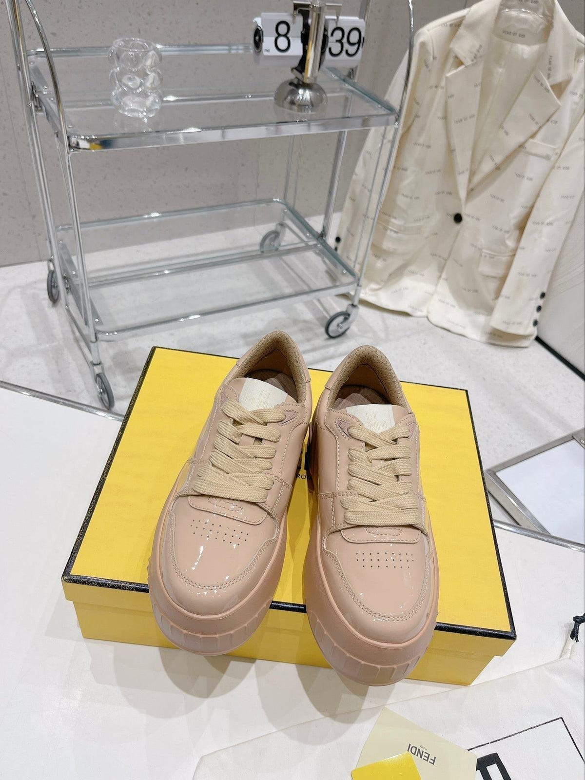 FENDI LOW-TOP TRAINER IN TAN BEIGE CALFSKIN