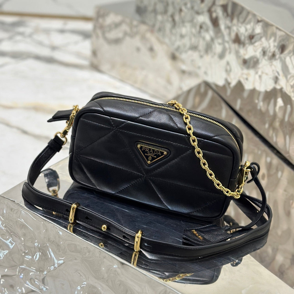 CAMERA BAG 22 IN BLACK TRIANGLE PATTERN QUILTED LAMBSKIN GOLD HARDWARE