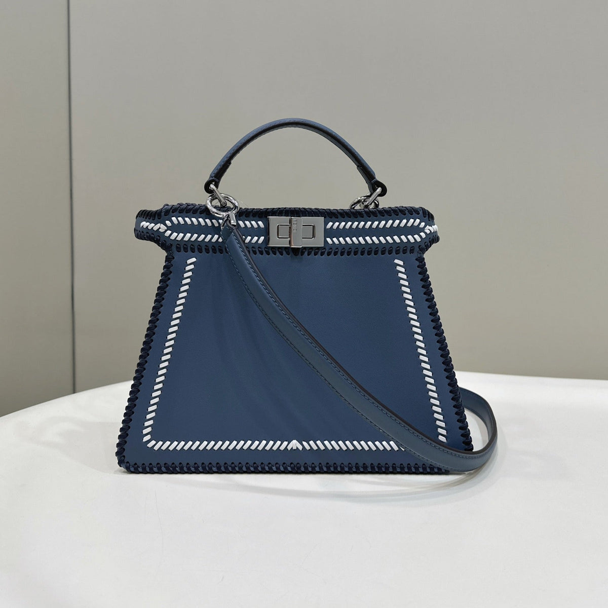 PEEKABOO ISEEU 27 IN BLUE BAYOUX INTERLACED CALFSKIN SILVER HARDWARE