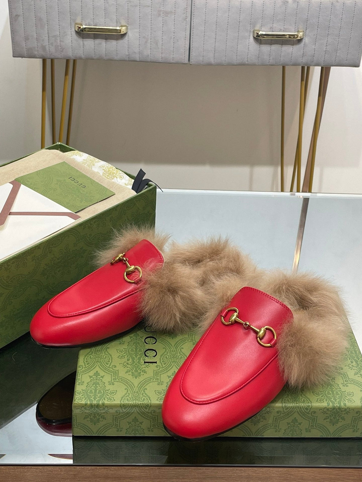 HORSEBIT MULE IN CHERRY RED CALFSKIN AND LAMB WOOL LINING