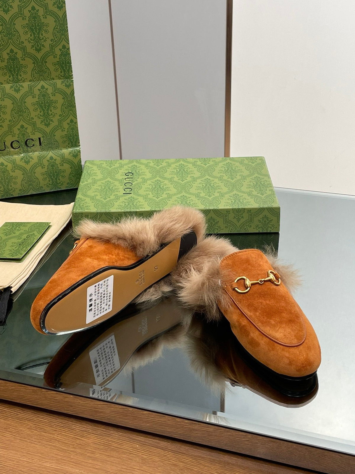 HORSEBIT MULE IN BRONZE ORANGE SUEDE AND LAMB WOOL LINING