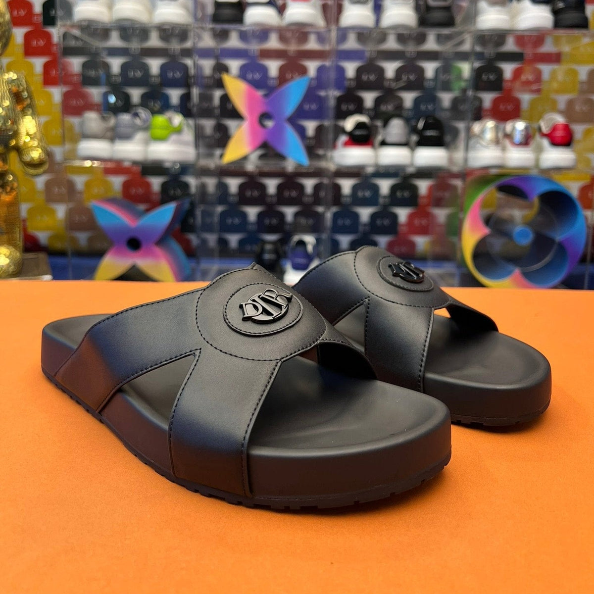 CD CIRCLE SLIPPER BLACK CALFSKIN