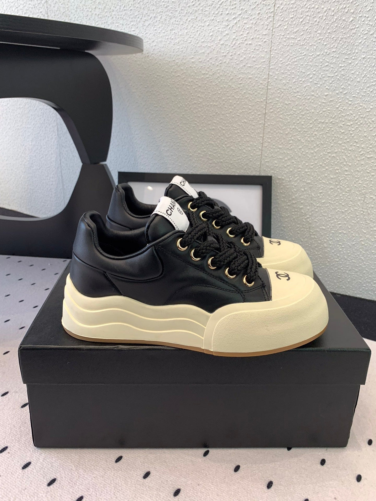 CC Sneaker 50mm In Black Cowhide 147067