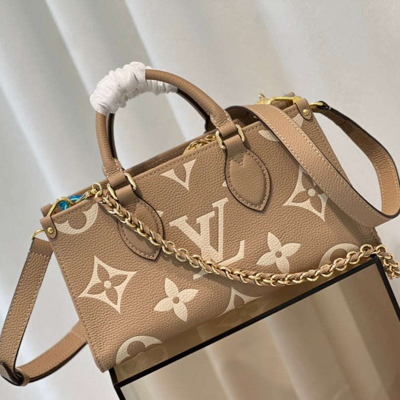 onthego 25 east west da bicolor monogram empreinte