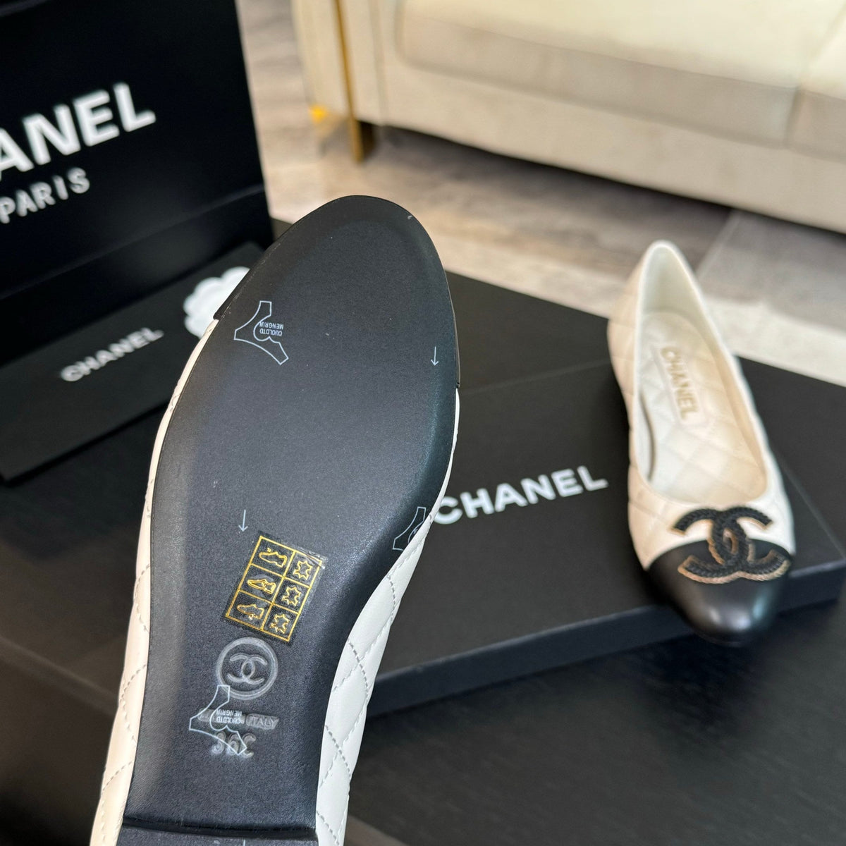 ballet flat white quilted lambskin large black cc logo
