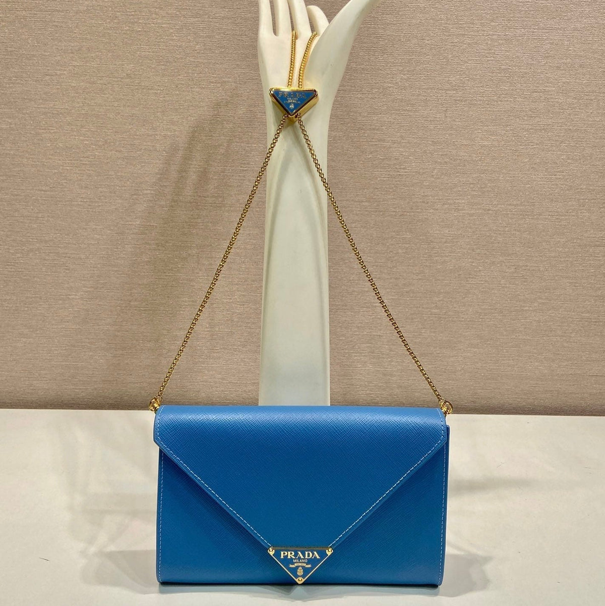 PRA Cross pattern envelope bag blue leather 341158