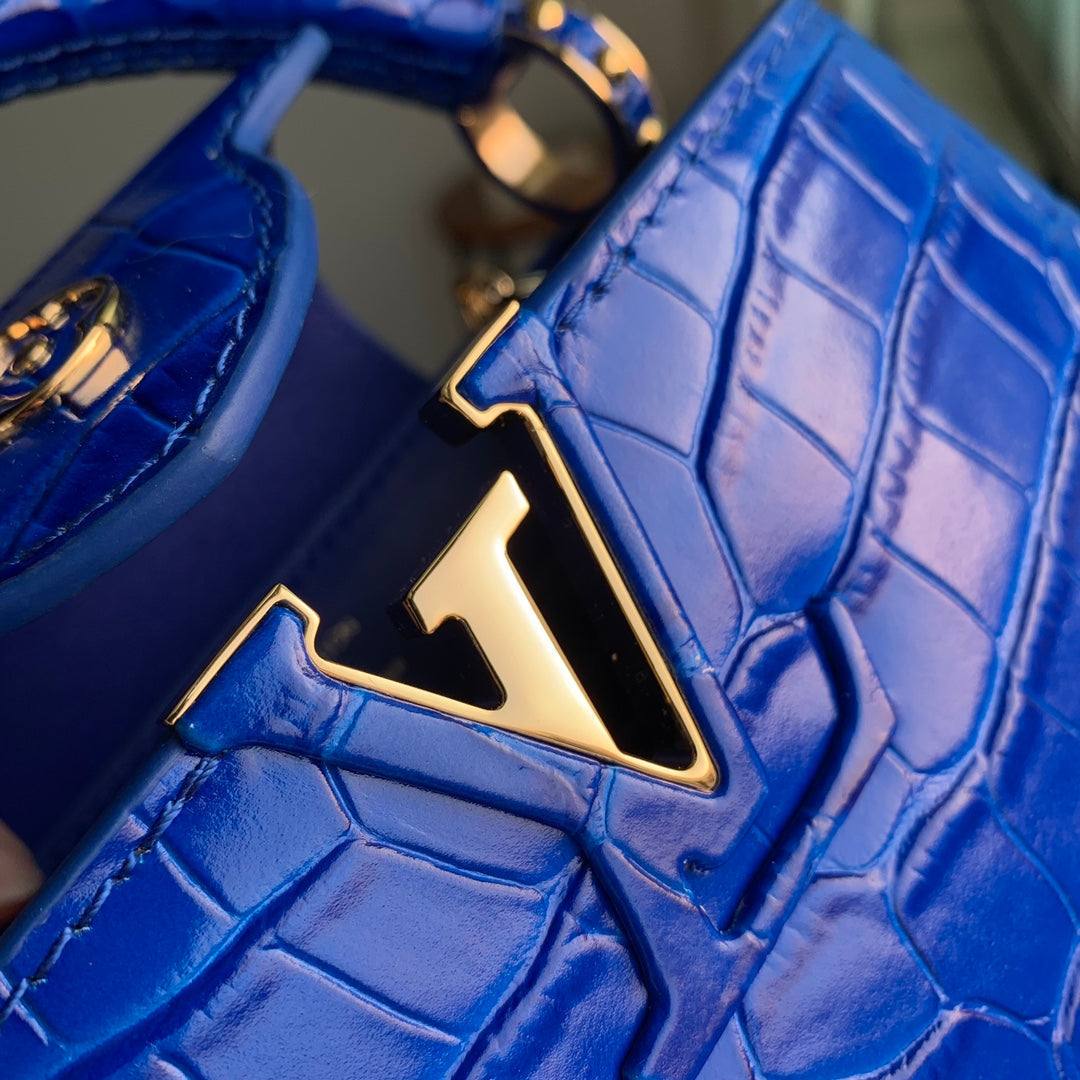 CAPUCINES MINI 21 COBALT BLUE CROCODILE EMBOSSED CALFSKIN GOLD HARDWARE