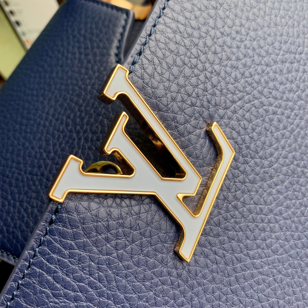 CAPUCINES MINI 21 DARK BLUE TAURILLON GOLD HARDWARE