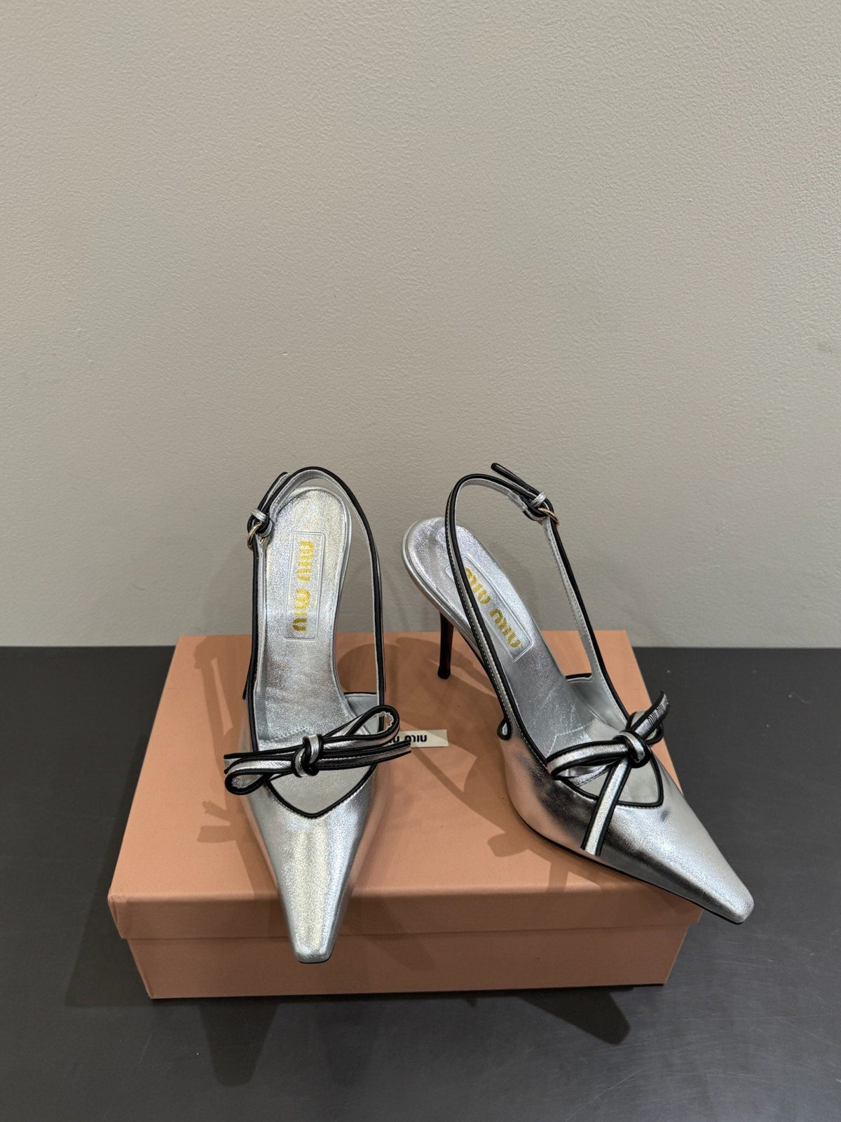 Miu slingback pump metallic sliver leather