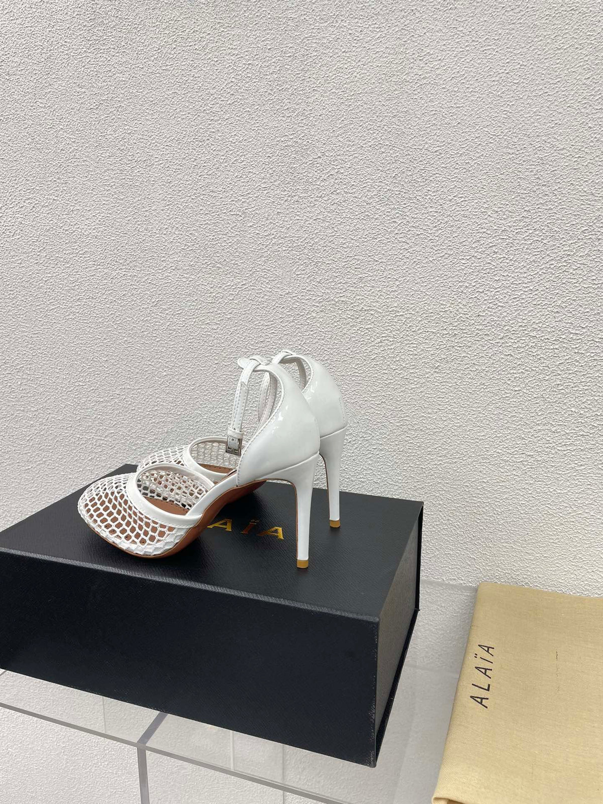 ALAIA HIGH FISHNET 9 CM PUMPS IN WHITE MESH