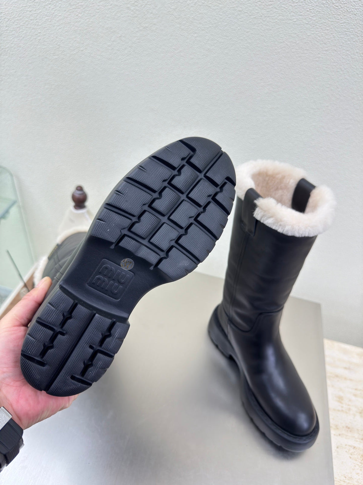 MiuMiu 25 platform boots black calfskin wool 522429