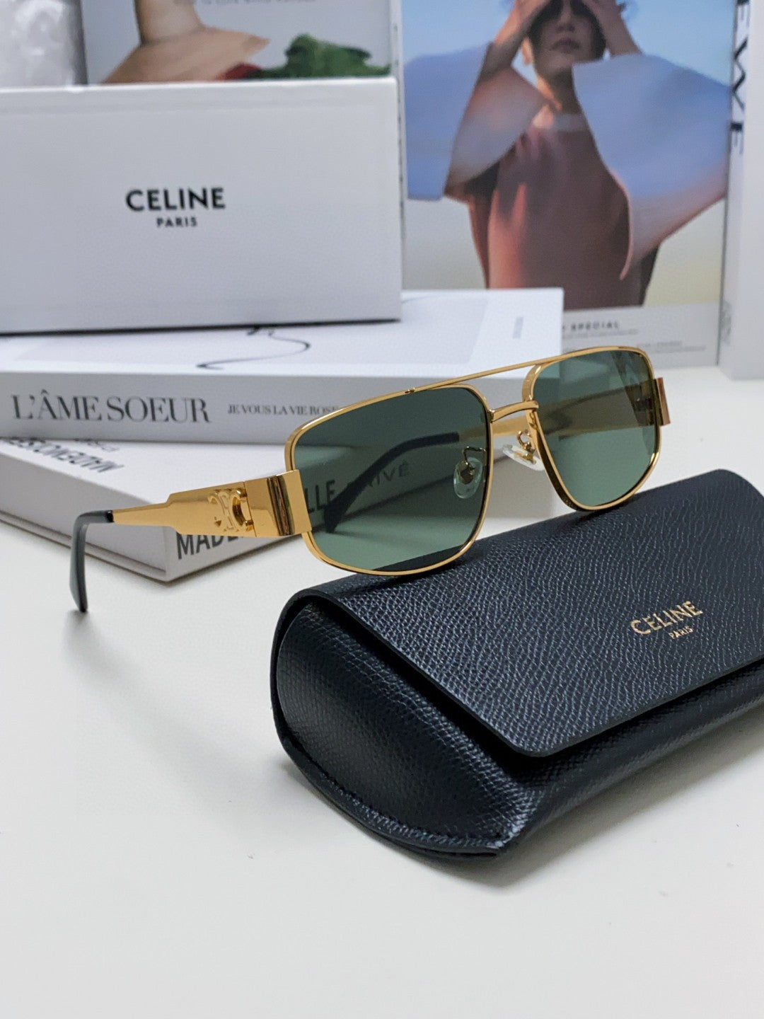 TRIOMPHE SUNGLASS 512997 IN GOLD METAL BLUE LENSES