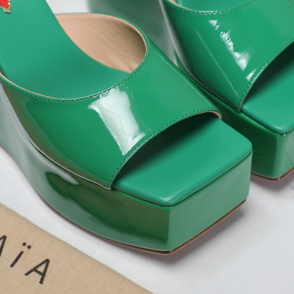 ALAIA PLATFORM WEDGE IN COOL GREEN LAMBSKIN WITH RED HEART