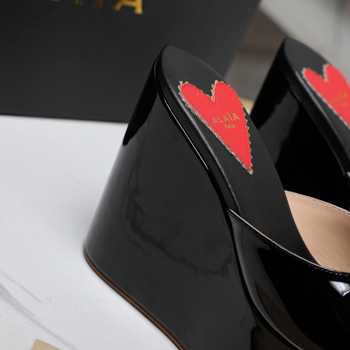 ALAIA PLATFORM WEDGE IN BLACK LAMBSKIN WITH RED HEART