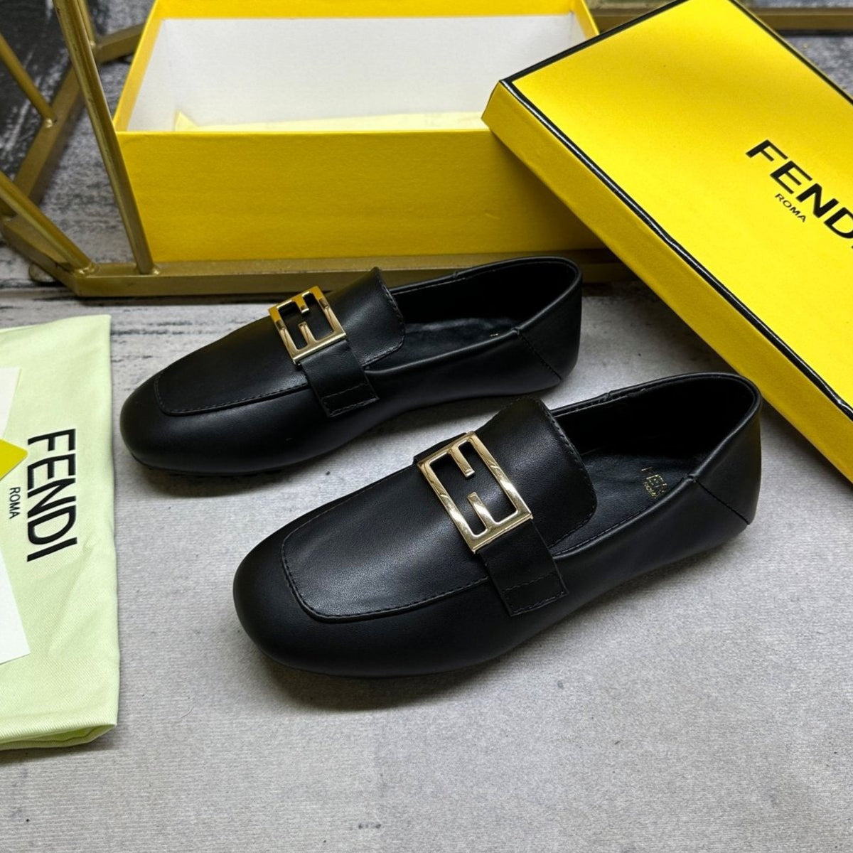 FENDI LOAFERS IN BLACK LAMBSKIN GOLD BUCKLE